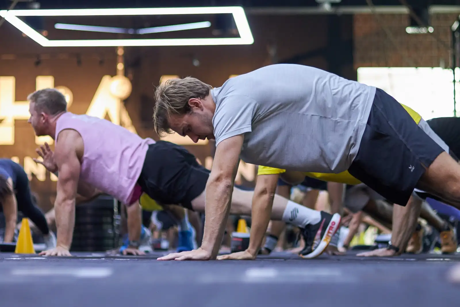 A class working through floor drills during an endurance session