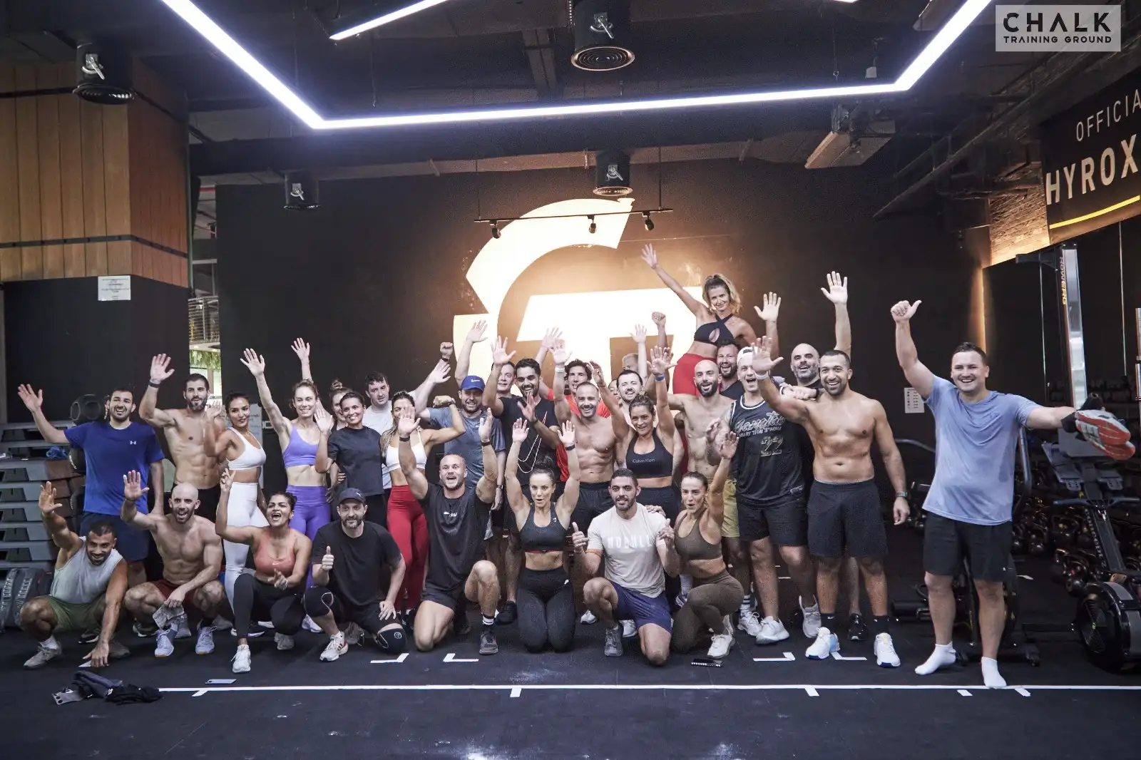 The Chalk Training Ground community gathered for a group photo on the gym floor