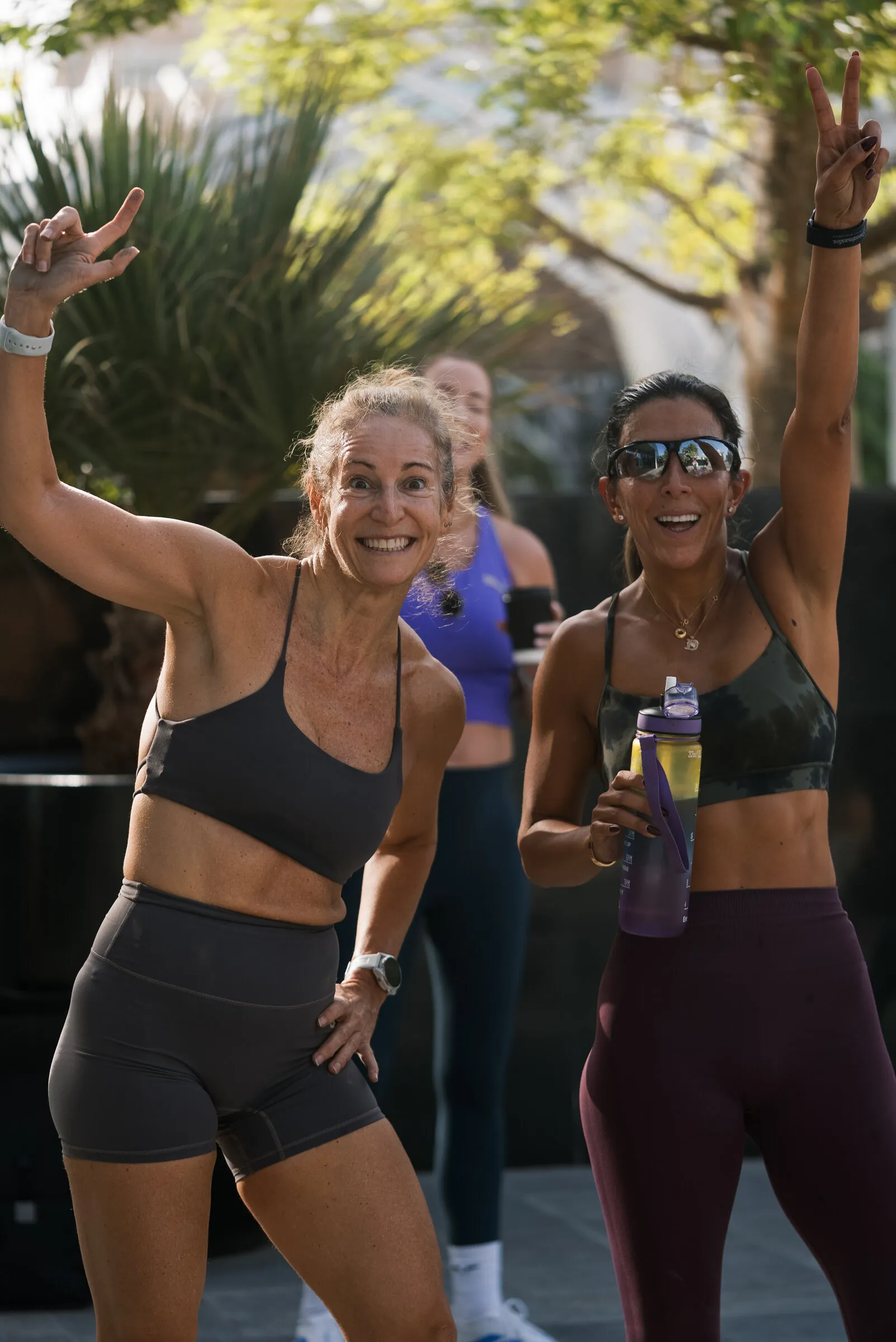 Two Chalk Training Ground members post-class, outdoors